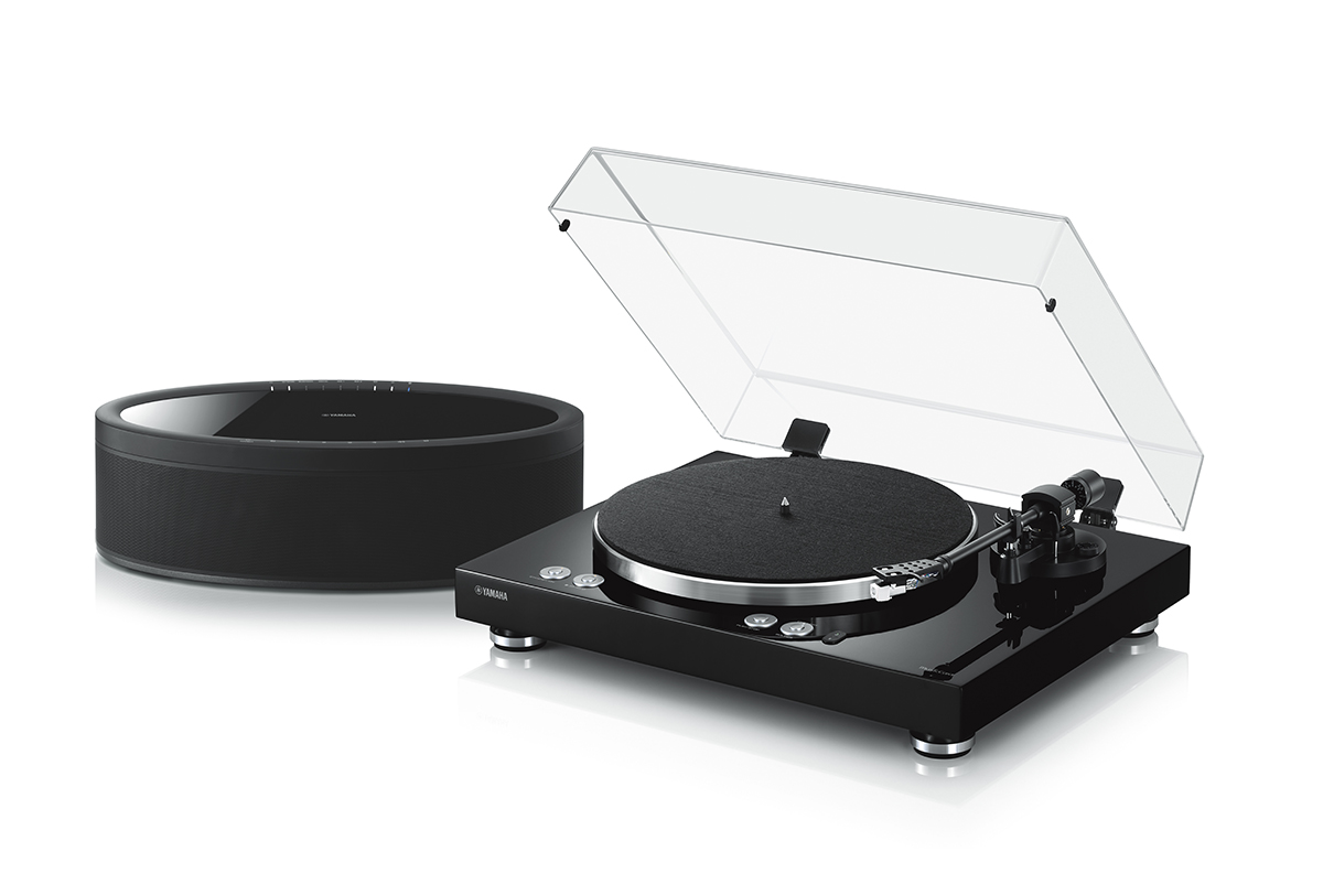 Hifi History Body Image 6 An image of a turntable next to a high-quality speaker.