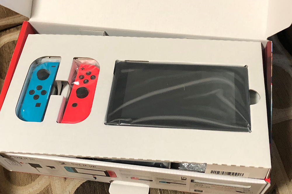 open box switch image Nintendo Switch console in the box.