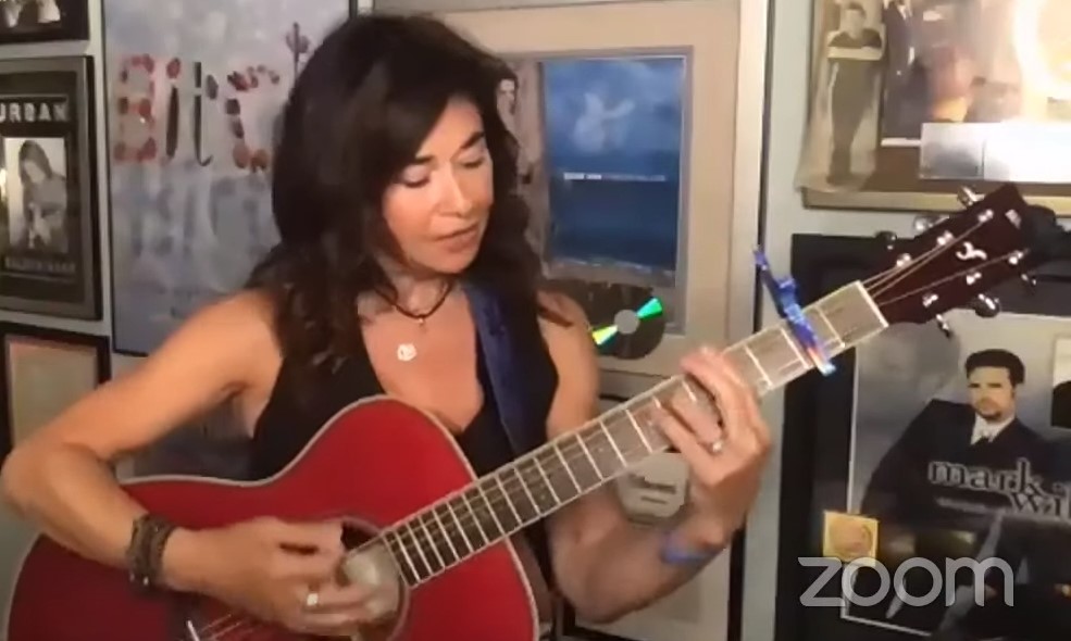 SP livestream screenshot Shelly Peiken playing red FS-TA guitar during Zoom livestream.