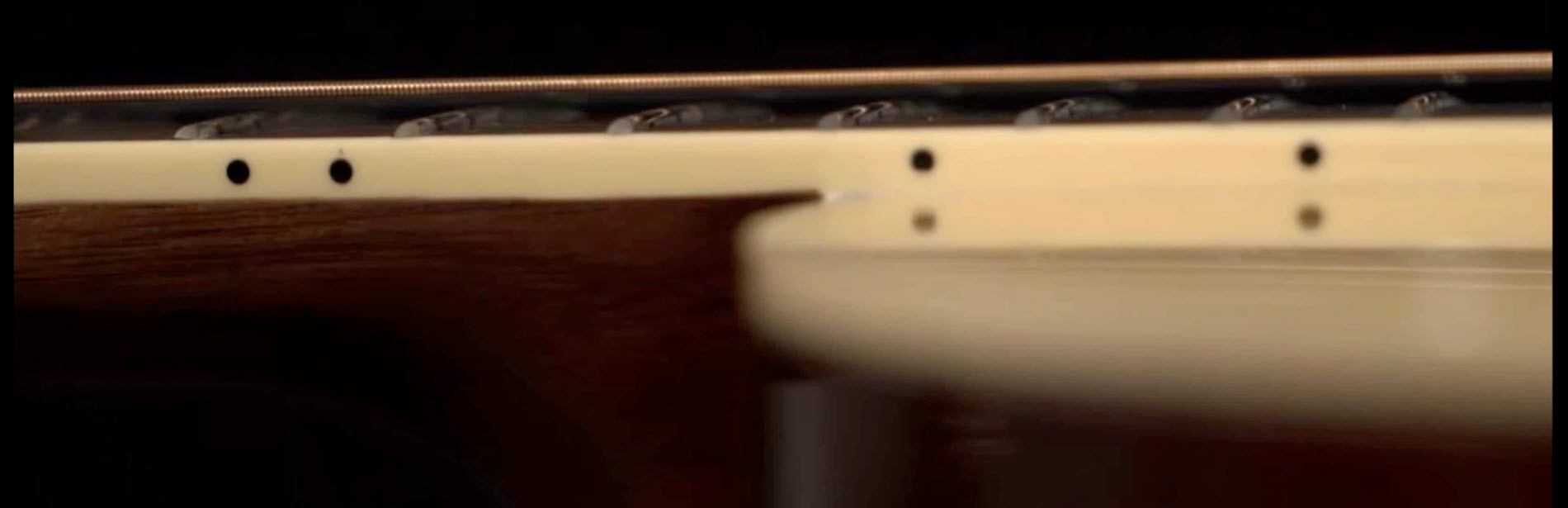 How-to-choose-guitar-fig-7 Side view of a guitar.