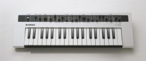 An electronic mini-keyboard.